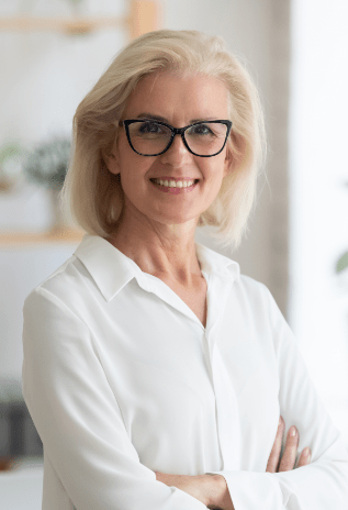 A person wearing glasses and a white shirt.