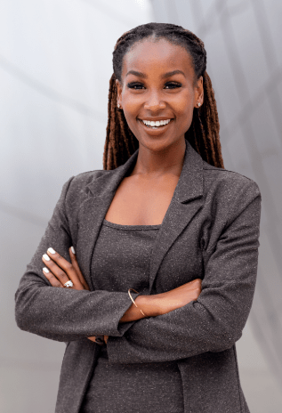 A person standing with their arms crossed.