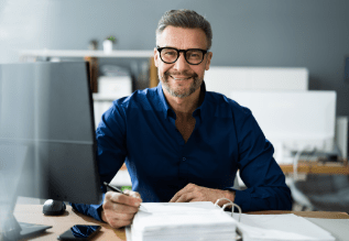 Person sitting at a desk working.