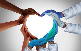 Several hands, adorned with gloves, united to form a heart.