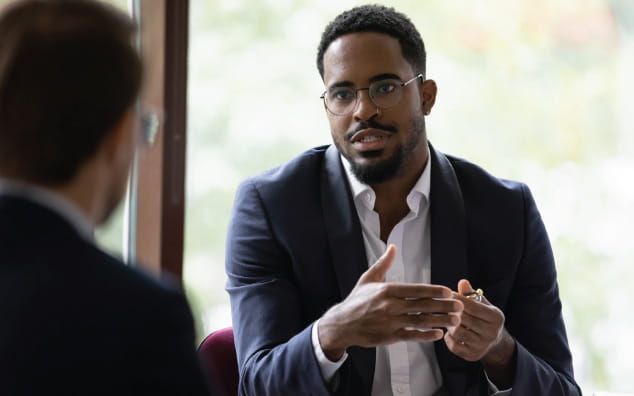 Business professionals in a meeting together.