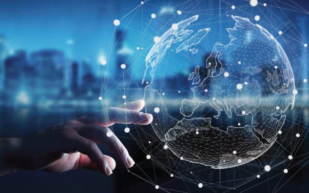 Hand on digital globe exploring the vast data Sitetrove provides globally.