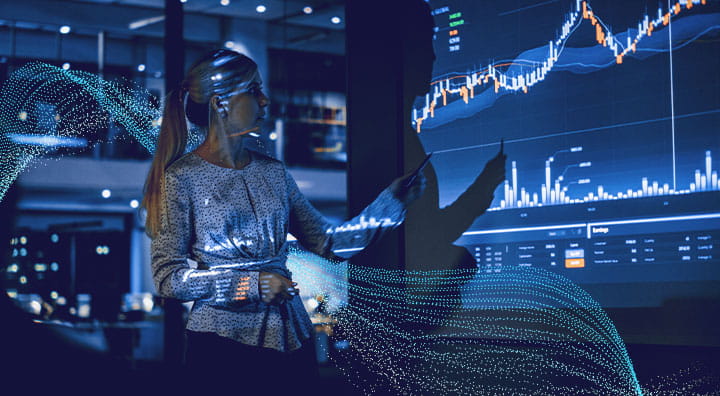 Woman looking at the screen with a graph