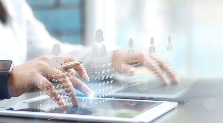 DMS being setup by IT consultant working on laptop