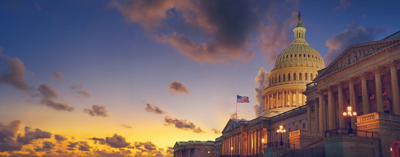 The United States Capitol building at sunset.