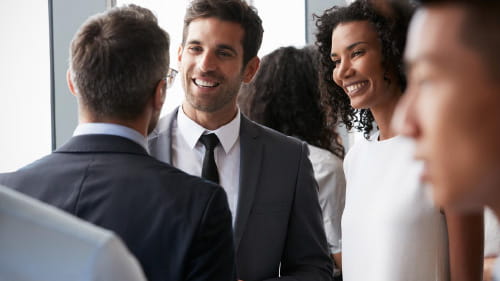 Marketing professionals gathered together to provide curated marketing materials.